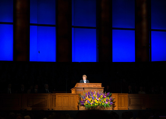 Sister Clark addresses students during devotional in the BYU-Idaho Center at the beginning of each semester along with President Clark.