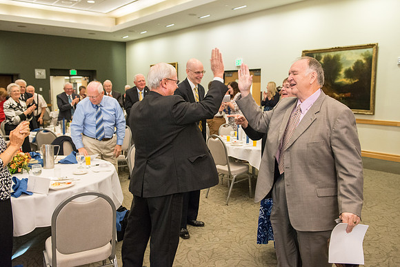 Ricks College Alumni gather to honor John and Trudy Bidwell at an Emeritus Breakfast.