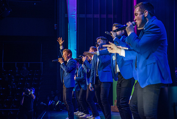 Vocal Point performs during Power to Become, held in the Hart Auditorium.