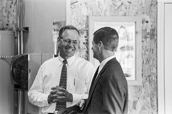 President David A. Bednar speaks to Rudy Puzey at the Construction Management and Technology Lab Dedication. Aug 1998.