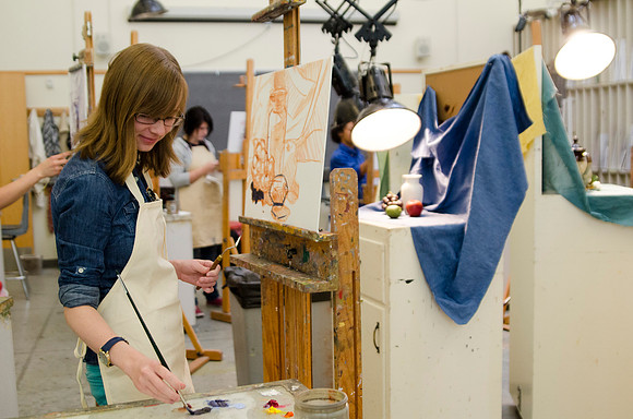 David Belka enthusiatically teaches painting principles to beginning painting class.