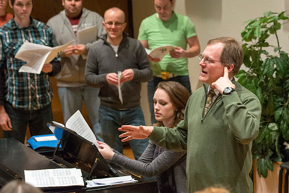 Randall Kempton instructs the talented students who make up the Collegiate Singers at BYU-Idaho.