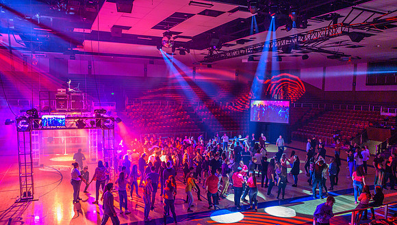 First Friday is a campus wide party to celebrate the start of the new school year. Activities include escape rooms, dancing, games, inflatables, food, comedy performances, blacklight dodgeball, nerf