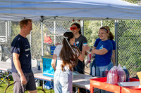 Students gather at the upper field for various 4th of July activities.