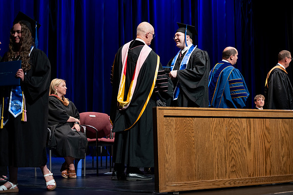 Graduates during convocation for the College of Performing and Visual Arts.