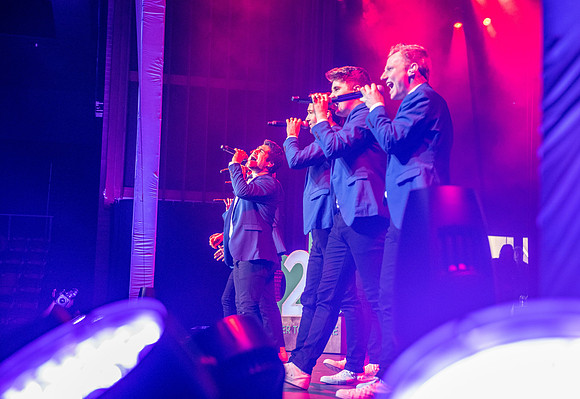 Vocal Point performs during Power to Become, held in the Hart Auditorium.