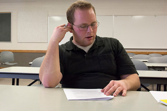 Students participate in the Writing Workshop to receive critiques on their work.