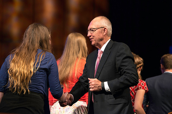 Emeritus General Authority of the Seventy greets students after the BYU-Idaho devotional.