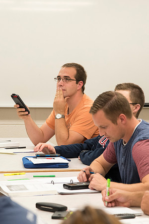 Students in a Civil Engineering class, Reinforced Concrete Design, are taught by Nathan Harris.