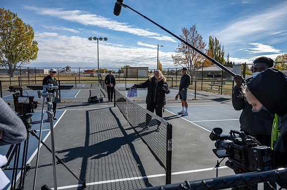 Dinking around playing pickleball for the HR Wellness Video.
