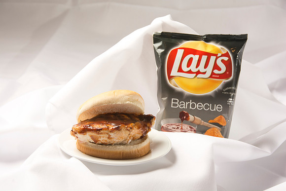 This savory chicken breast is marinated in a homemade barbecue sauces and cooked to perfection. Served with Lay's Barbecue chips.