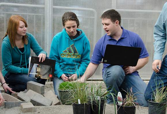 College horticulture class works with high school students to redesign the Clark playground facilities.
