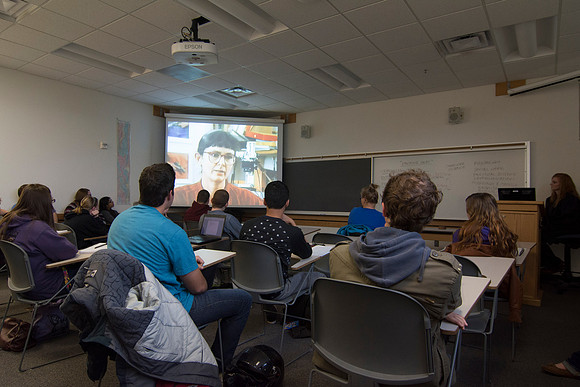 Students watch a video in Sister Jenson's Criminology class entitled, "Packing Heat," about women using weapons.