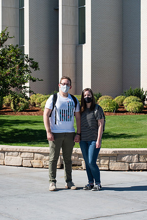 Examples of students staying safe and healthy during the COVID-19 pandemic by social distancing, following pathway arrows, and wearing face masks.