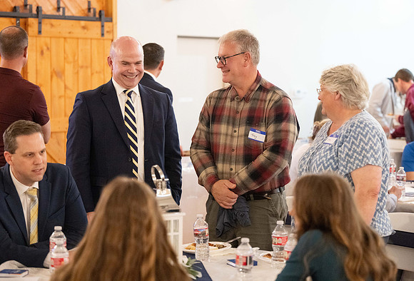 Alumni in the Cache Valley area gather at Eagles Landing Event Center, in Smithfield, Utah and get the chance to listen to and meet President Meredith.