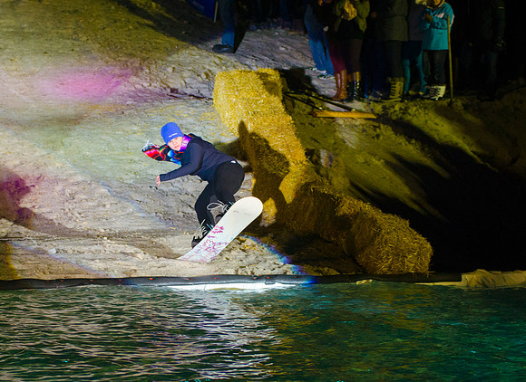 Students at Brigham Young University-Idaho take part in the annual Pond Skimming event held on campus at BYU-Idaho. Students wait in the cold or take the daring attempt to skim a pool of water using a