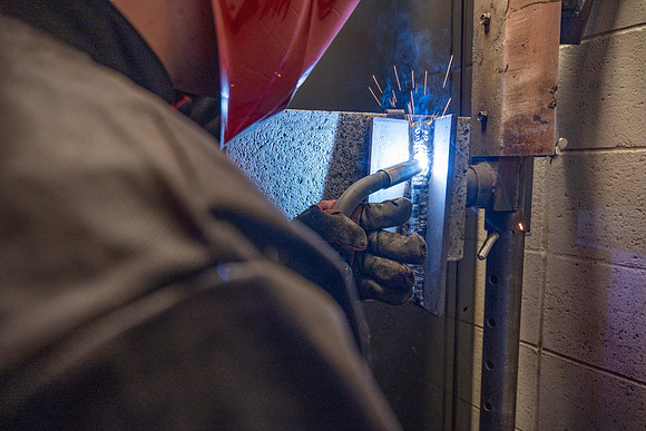 Students working in the welding lab.