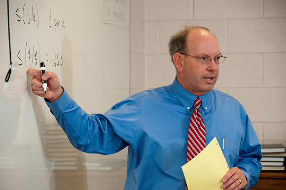 Economics capstone class taught by Kirk Gifford.