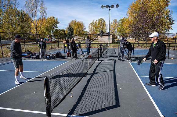 Dinking around playing pickleball for the HR Wellness Video.