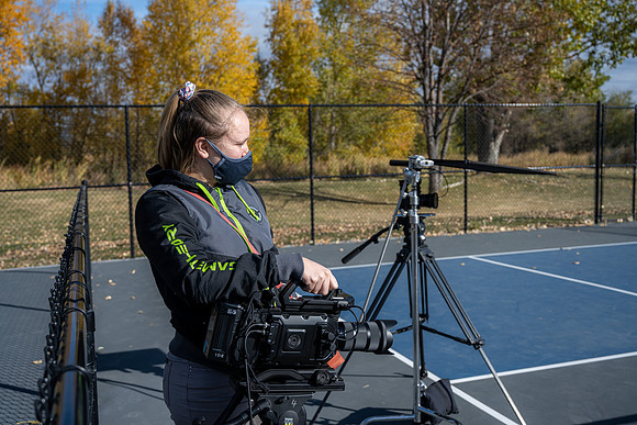 Dinking around playing pickleball for the HR Wellness Video.