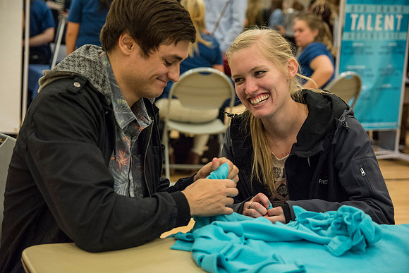 Students do a variety of service activies together with their dates.