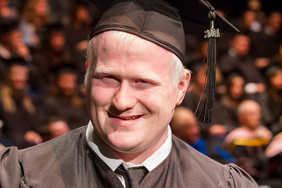 Dean's of the College of Performing and Visual Arts award diplomas to graduates during convocation held in the Snow Building.