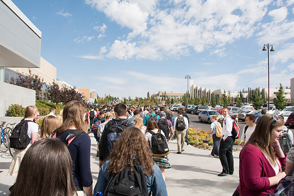 Students gather to listen to President and Sister Clark talk in the i-Center for the first devotional of the semester.