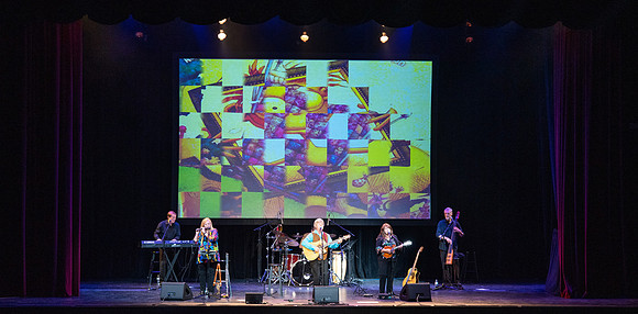 Jim Curry performs songs of John Denver at the Hart Auditorium.