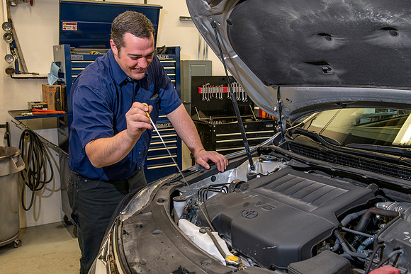 Servicing Presidents Clarks car.