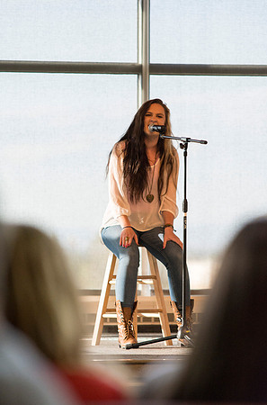 A contestant in The Last Voice Standing performs on the Crossroads stage during the 2014 Spring Semester.