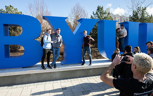 Unveiling of a new monument on campus: BYUI letters just below the Taylor Quad.