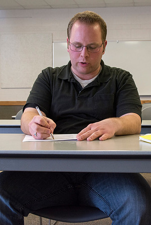 Students participate in the Writing Workshop to receive critiques on their work.