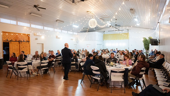 Alumni in the Cache Valley area gather at Eagles Landing Event Center, in Smithfield, Utah and get the chance to listen to and meet President Meredith.