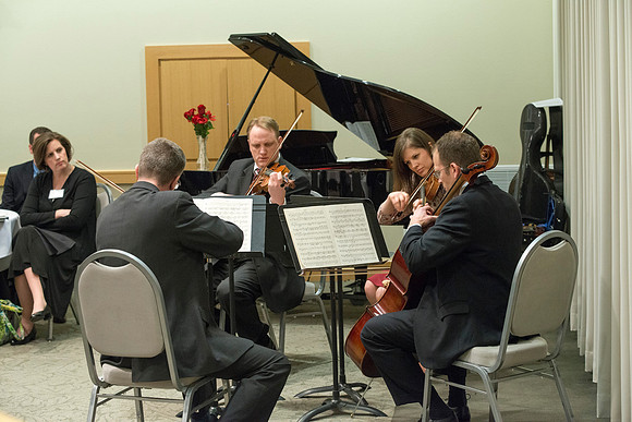 Eliza R. Snow Award members and guest enjoy an evening of god food and entertainment honoring Rick and Cheryl Hansen for their service towards the Arts.