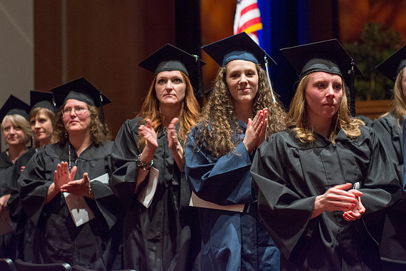 Students show their appreciation to those who supported them throughout their education at the commencement ceremony. Photo by Ryan Chase