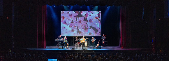 Jim Curry performs songs of John Denver at the Hart Auditorium.