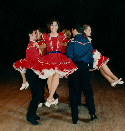 Folk dancers perform.