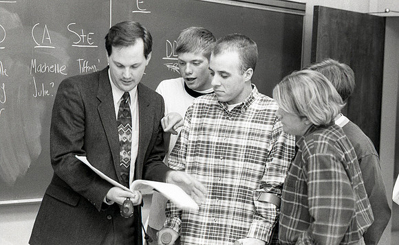 Communications students work alongside their instructor, Eric Embree.