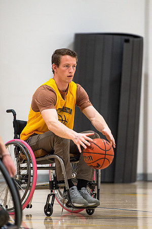 Students participate of Wheelchair Basketball in the Hart Gym.