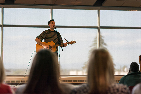 Aaron McCall performs during The Last Voice Standing in the Crossroads, Wednesday night during the 2014 Spring Semester.