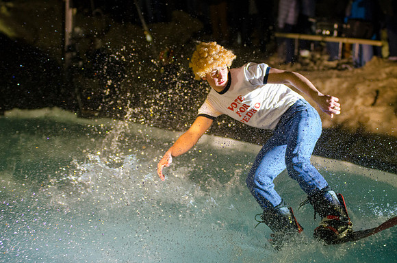 Students at Brigham Young University-Idaho take part in the annual Pond Skimming event held on campus at BYU-Idaho. Students wait in the cold or take the daring attempt to skim a pool of water using a