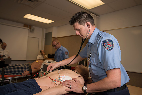 Cory Marriott and his peer pass off EMT requirements during lab held in the Clarke Building.