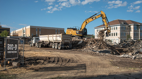 Remnants of the old Kirkham Building being hauled away.