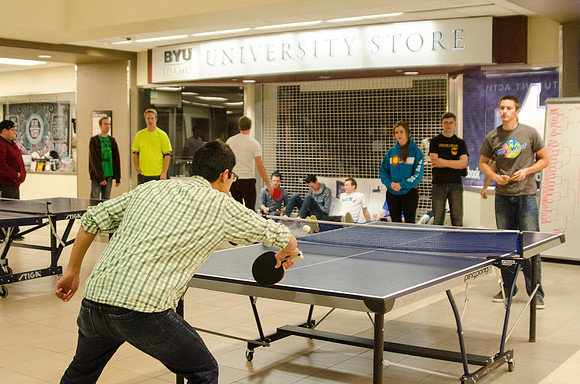 BYU-Idaho students participate in a ping pong tournament held in the Manwaring Center