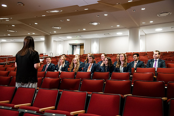 Ushers perform their duties in the I-Center to prepare for devotional. Used for an usher training video.