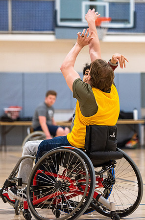 Students participate of Wheelchair Basketball in the Hart Gym.
