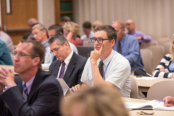 Faculty members come together in preparation of the new school year.