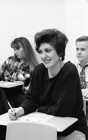 Students and teachers participating in an english class