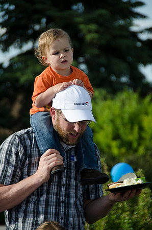 Online instructors gather with their families for an eveing of BBQ and games.
