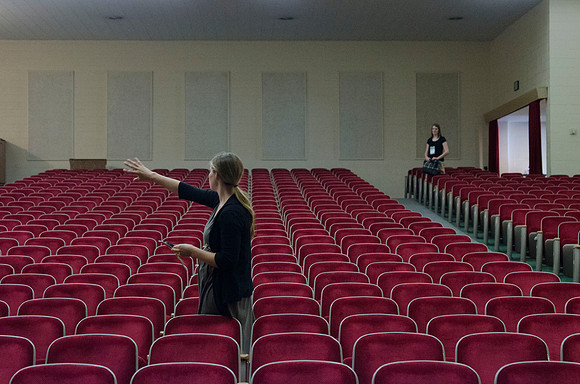 Participants count the seats in the Kirkham Auditorium.